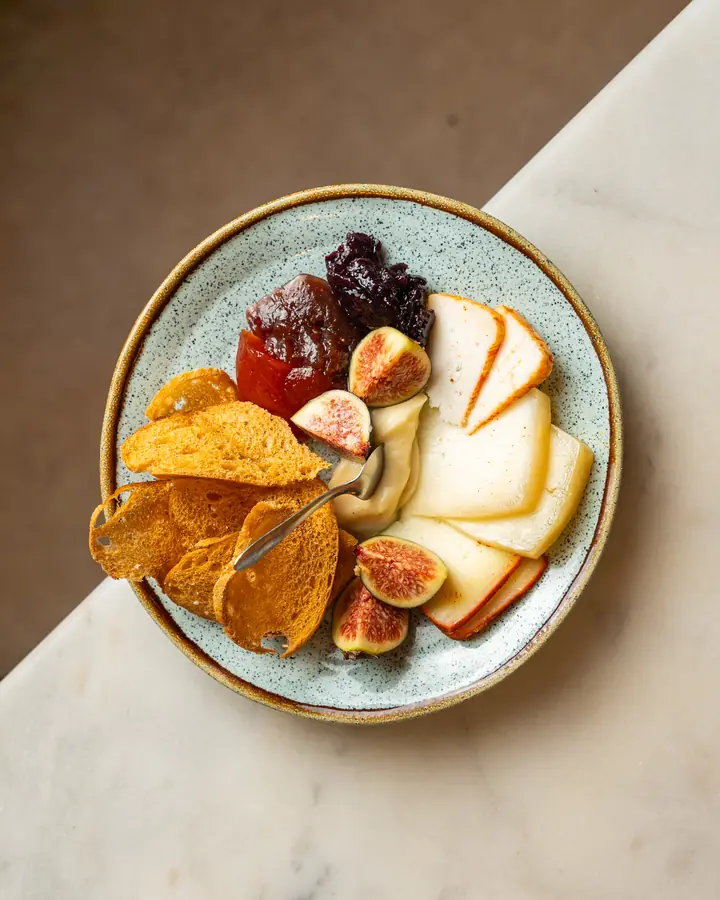 Portuguese cheese board with figs, jam and toasts